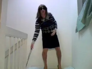 Amateur crossdresser solo on a floor