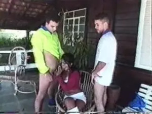 Latina tranny pleases two stud on a verandah