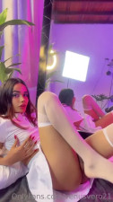 Stroking her cock in her white skirt and shooting a load