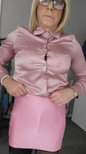 Crossdresser with a hard cock in a skirt