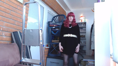 Redhead in a black dress