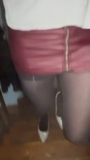 Crossdresser in leather dress