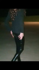 Annemieke in catsuit in the park at night