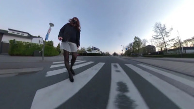 Walking on the street in sheer skirt
