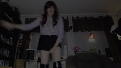 Mini skirt and high heeled boots