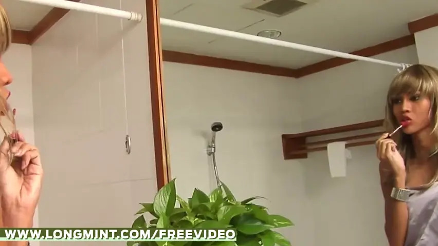 Watch Blonde ladyboy in purple dress uses a hair iron on her monster cock Shemale Porn Videos | TranSexBig.