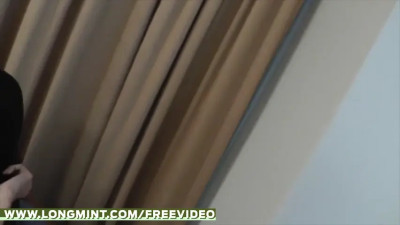 Brunette ladyboy in black lingerie teases in multiple positions on chair