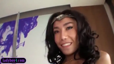Wonder Woman ladyboy with big tits fucks a guys ass